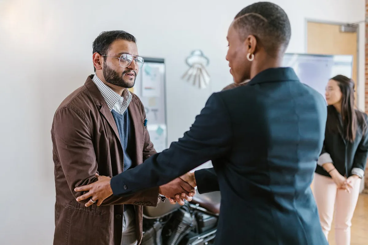 pexels-rdne-7413999 Photo by RDNE Stock project: https://www.pexels.com/photo/a-man-and-a-woman-shaking-hands-doing-business-7413999/